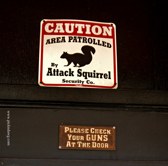 Area Patrolled by Attack Squirrels check guns signs pickndawg Dan Cunningham