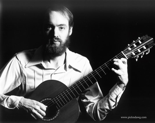 Dan Cunningham with classical guitar pickndawg photo by Ben Pearson