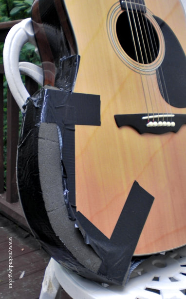 Foam pad armrest for guitar